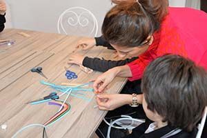 5th Grade German Language Students at Quilling Activity